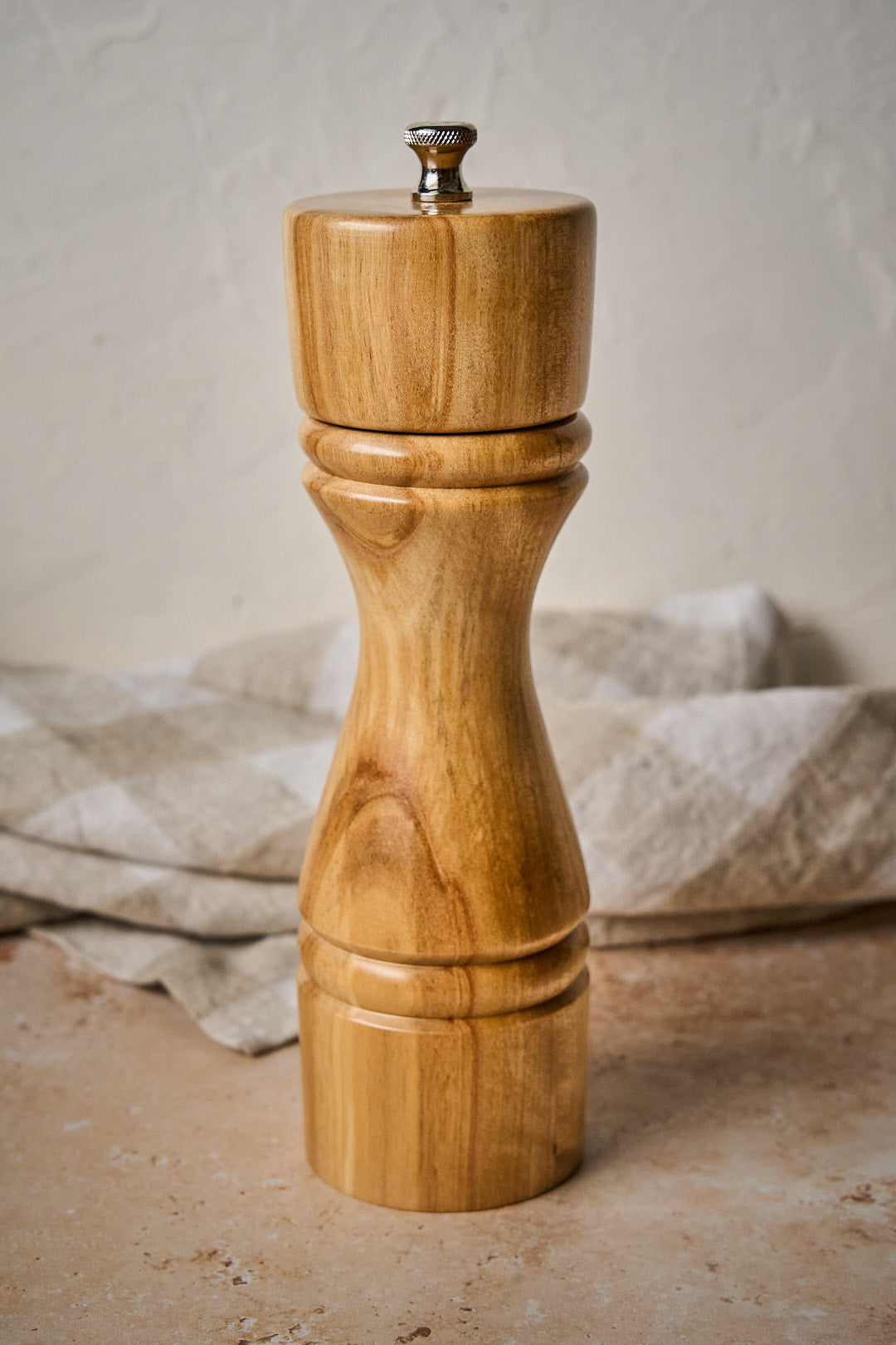 Close-up showing the grain patter on the handmade pepper mill