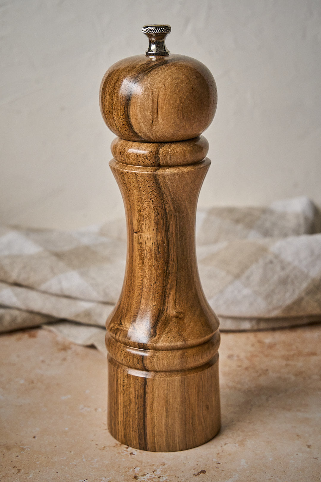 Elegant Budapest handmade walnut pepper mill showcasing a polished wooden finish and professional-grade mill steel mechanism.