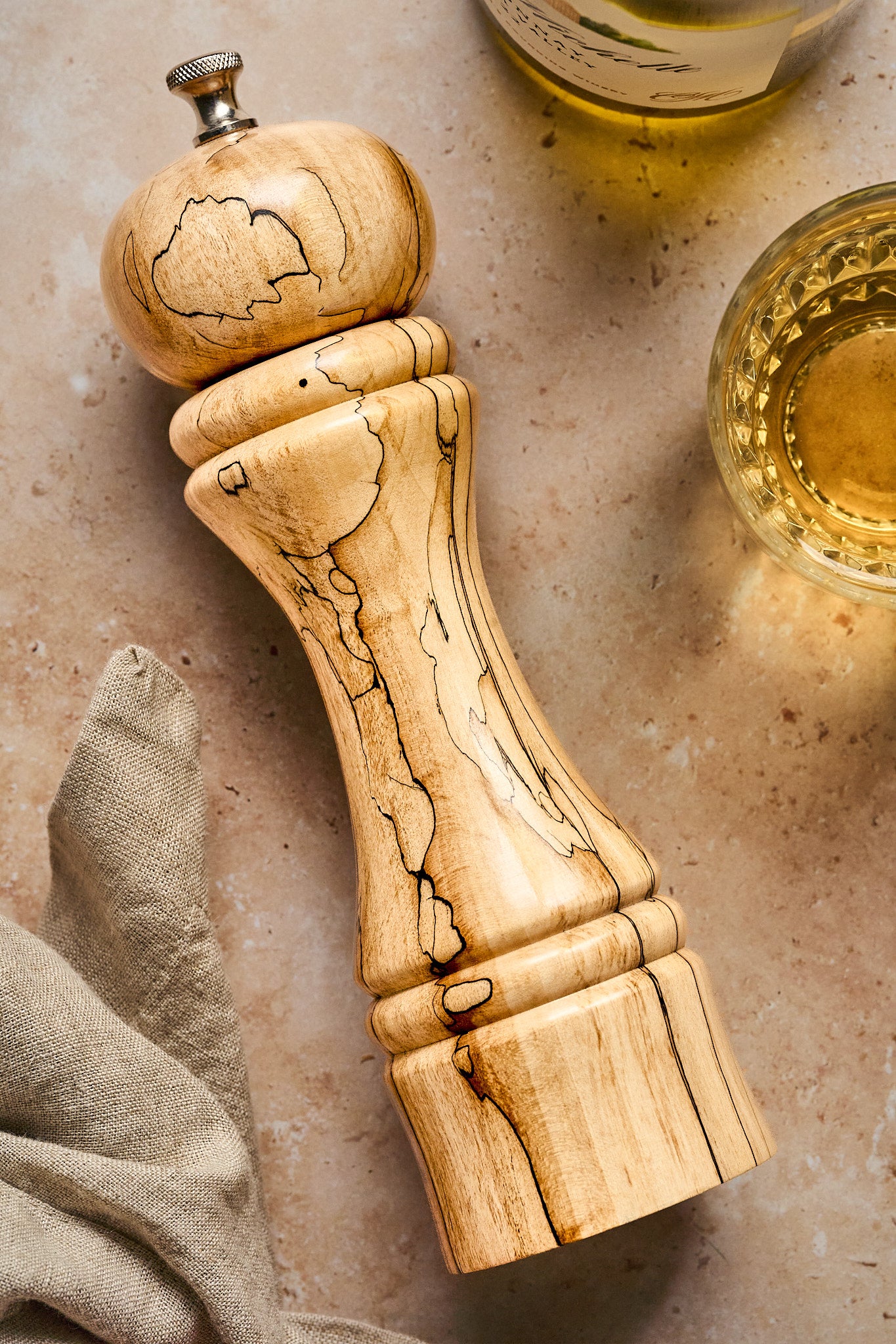 Close-up showing the spalting lines on this unique tall pepper mill